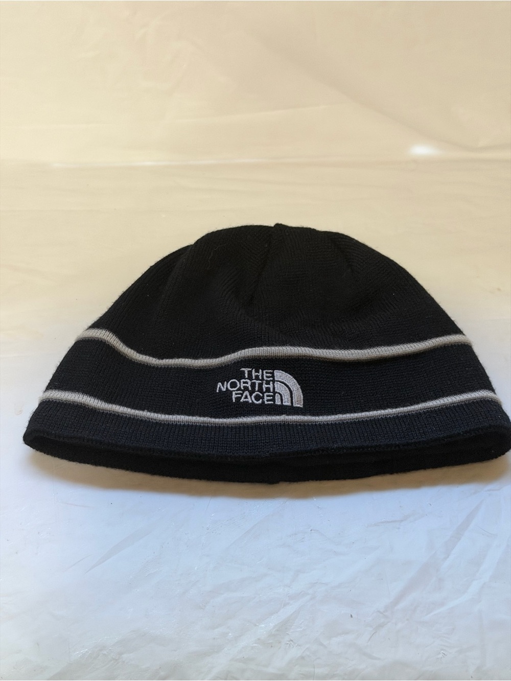 The North Face Black Beanie with Gray Stripe Accents